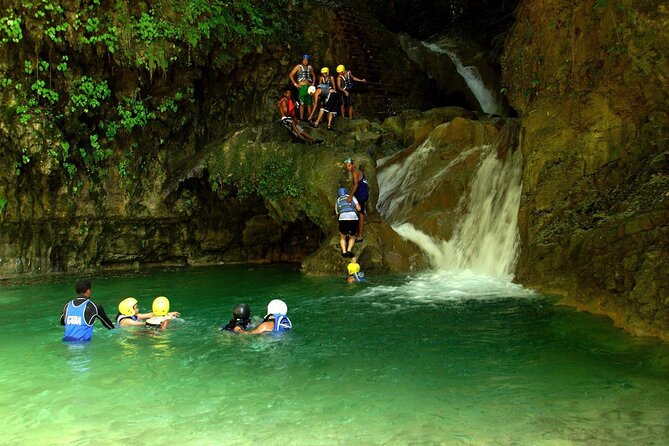 Amber Cove and Taino bay Cruise Ship – 7 Waterfalls - Helmets, life jackets, and guides at the falls