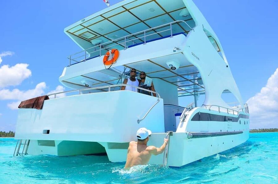 Bayahibe: Saona Island Catamaran Cruise with Natural Pool - Sailing the coast toward Saona