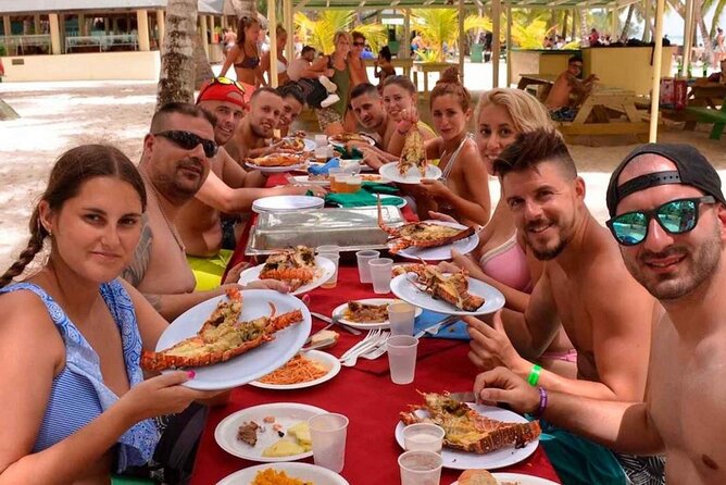 Caribbean Paradise Exclusive Day Trip to Isla Saona - Dominican lunch, music, and drinks onboard