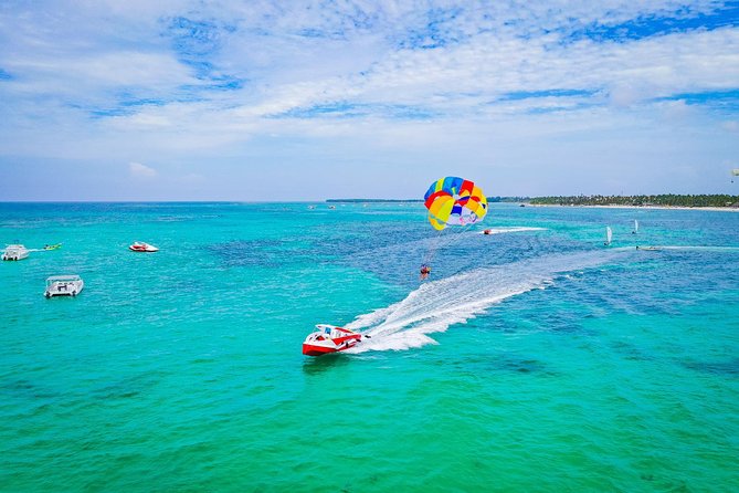 Catamaran Cruise with Snorkeling & Parasailing - Boarding the Catamaran With Drinks and Music