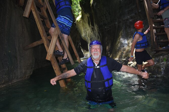 Excursion in Damajagua's 7 Waterfalls With Food Included DR! - Seven waterfalls with jumps, swims, and slides