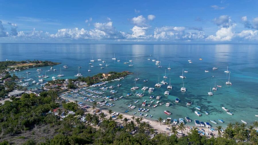 From Punta Cana: Catalina Island Swim, Sail & Snorkel - Bachata and merengue on the ride home