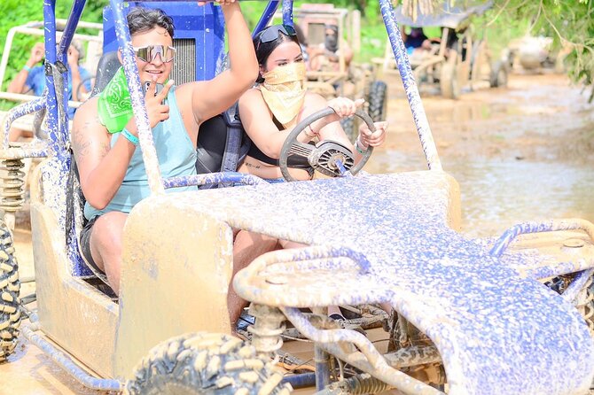Full-day Buggy & Party Boat tour: snorkel, open bar, cave pool - Boarding the catamaran for snorkeling