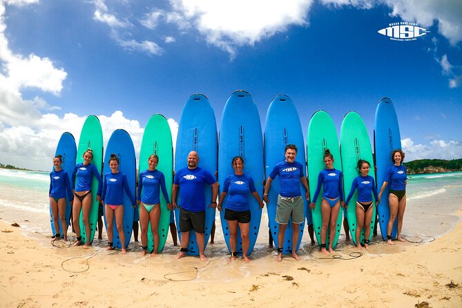 Group Surf Lessons Punta Cana – Fun, Easy & Beginner-Friendly - The land briefing and the first push into the waves