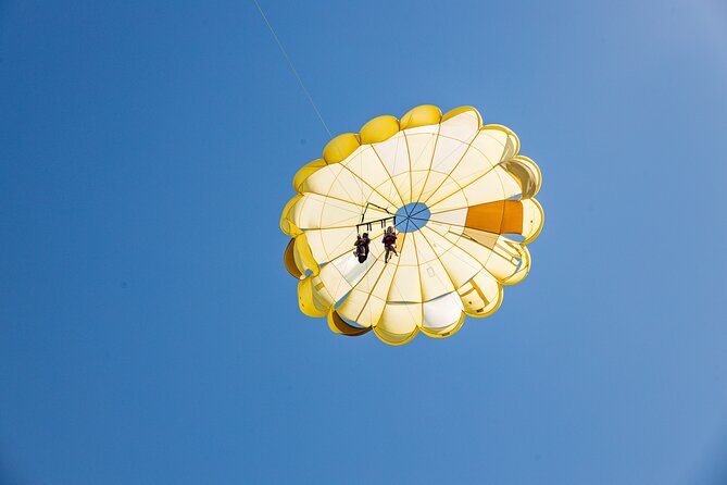 Parasailing Yacht Experience in Punta Cana - Safety briefing, harness, and takeoff