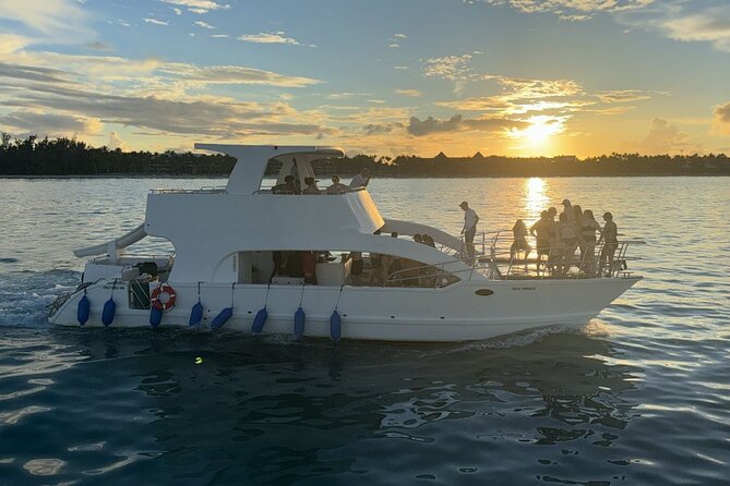 Private Catamaran Booze Cruise & Snorkeling - Three hours of music, drinks, and dancing