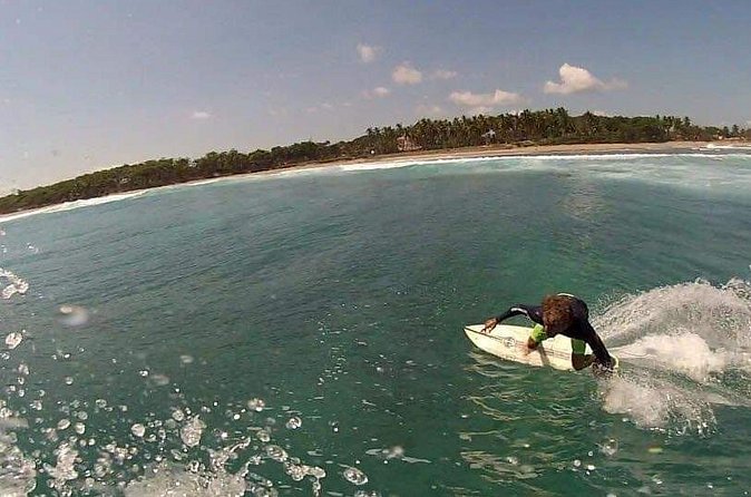 Professional surf lessons Dominican Republic, Cabarete, Encuentro - An hour in the water with hands-on coaching