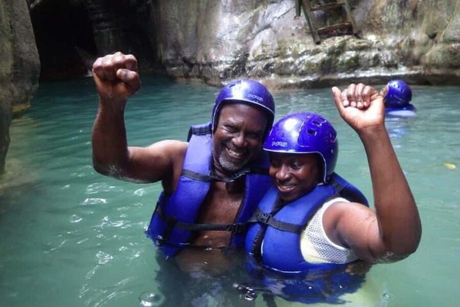 Puerto Plata: 27 Waterfalls Adventure with Traditional Lunch - Jumping, sliding, and swimming through the water