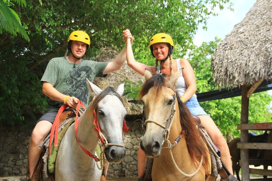 Punta Cana: Bávaro Adventure Park Horse Riding & Waterfalls - Taking the saddle through quiet park routes