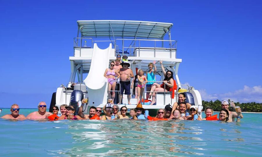 Punta Cana: Catamaran Tour with Reef Snorkeling and Open Bar - Boarding a spacious catamaran