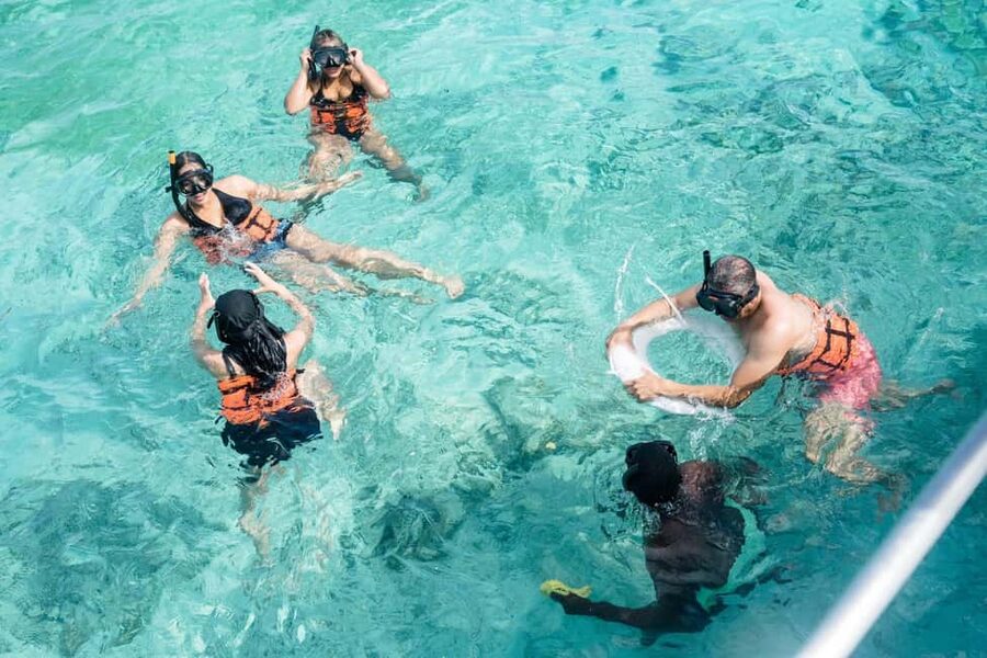 Punta Cana: Catamaran Tour with Reef Snorkeling and Open Bar - Food, cocktails, and the onboard rhythm