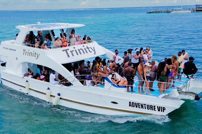 Punta Cana Hip Hop Party Boat with Open Bar <em>Adults Only – A Punta Cana Boat Party Built Around the Music’ /></p>
<p><p>Many boat trips in Punta Cana use music as background noise. This one puts it at the center. The sound moves through hip-hop, R&B, dancehall, and Afro Beats, giving the trip a clear identity from the start.</p>
</p>
<p><p>That matters if you want more than a standard catamaran ride. You can dance, join a game, watch a dance-off, or simply sit with a drink while the boat cruises. The crew handles the energy with music, group activities, and photo moments, so you are not left wondering what to do between stops.</p>
</p>
<p><p>The setting is adults only, which helps shape the mood. You can expect a party aimed at adult groups rather than a family outing. Couples may enjoy it, though the format is more social than romantic. If your ideal day at sea involves quiet conversation and a book, this is probably the wrong boat.</p>
</p>
<p><p>The experience has earned a 4.9 rating from 185 reviews, with 98 percent of customers recommending it. One especially strong point is the sense of fun from beginning to end. That matches the design of the trip: the party begins with the music and continues through the swimming stop, sand bar, games, and ride back.</p>
</p>
<div class="twil" style="margin: 20px 0; padding: 15px 0;"><p>More Boat Tours in Punta Cana</p><ul style="margin: 10px 0; padding-left: 0; list-style: none;"><li style="margin: 0 0 12px 0; padding: 0 0 12px 0; border-bottom: 1px solid #DBEBED; line-height: 1.4;"><a href="https://thedominicantraveler.com/punta-cana-catamaran-boat-to-saona-island-with-buffet-lunch/">Punta Cana: Catamaran Boat to Saona Island with Buffet Lunch</a><br><span style="font-size: 0.82em; color: #6A5273;"><span style="color: #00727F;">★</span> 4.4 · 3,822 reviews</span></li><li style="margin: 0 0 12px 0; padding: 0 0 12px 0; border-bottom: 1px solid #DBEBED; line-height: 1.4;"><a href="https://thedominicantraveler.com/small-group-cruising-and-snorkeling-catamaran-tour/">Small-Group Cruising and Snorkeling Catamaran Tour</a><br><span style="font-size: 0.82em; color: #6A5273;"><span style="color: #00727F;">★</span> 5.0 · 2,401 reviews</span></li><li style="margin: 0; padding: 0; border-bottom: none; line-height: 1.4;"><a href="https://thedominicantraveler.com/small-group-snorkeling-cruise-with-open-bar-and-light-snacks/">Small Group Snorkeling Cruise with Open Bar and Light Snacks</a><br><span style="font-size: 0.82em; color: #6A5273;"><span style="color: #00727F;">★</span> 5.0 · 1,296 reviews</span></li></ul></div><h2>What the $65 Price Covers</h2>
<p><img width="669" height="446" decoding="async" src=