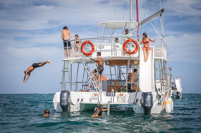 Small Group Punta Cana Snorkeling with Premium Open Bar - The sandbar, paddle boards, and onboard slide