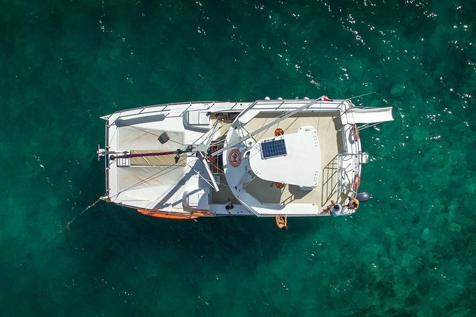 Small Group Snorkeling Cruise with Open Bar and Light Snacks - Slide, swimming, and time to simply float