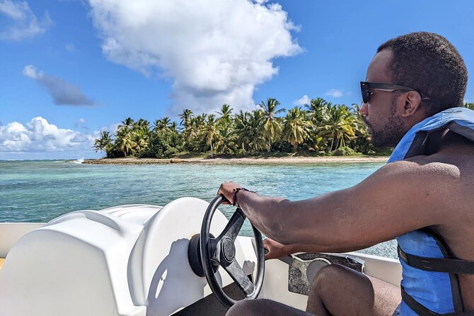 Speed Boat and Snorkeling in Punta Cana Bavaro - Taking the controls under the guide’s eye