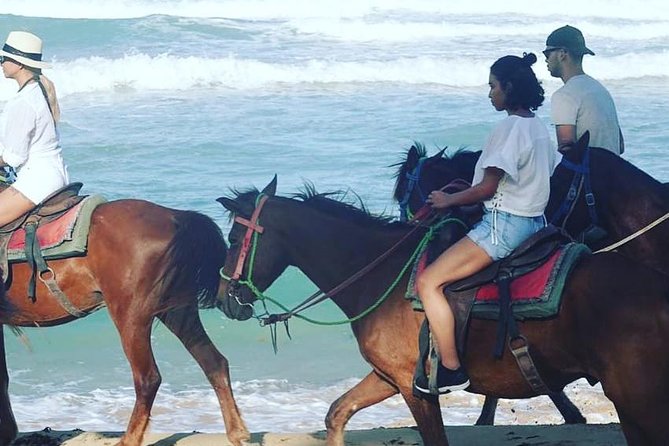 Sunset beach horsebackriding Punta Cana - Leaving Punta Cana’s resort strip behind